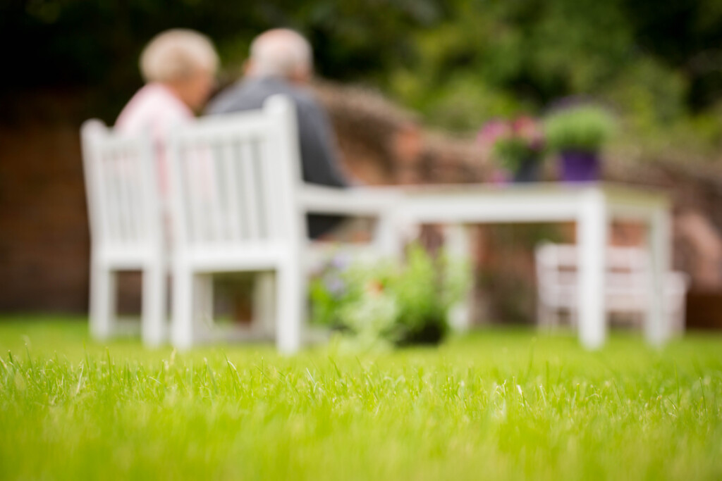 Care home residents in garden