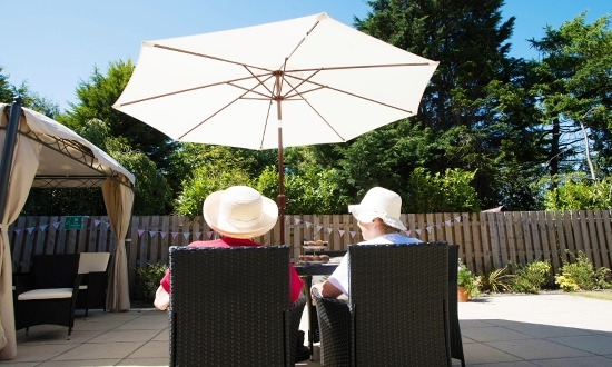 Residents on patio in care home