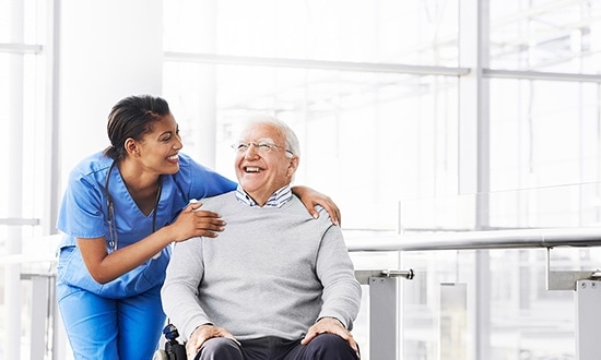 Care home carer with resident