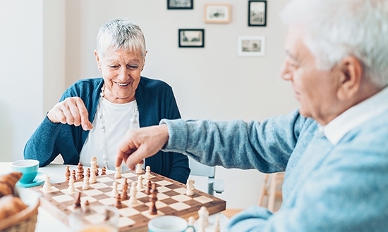 Care home residents playing chess